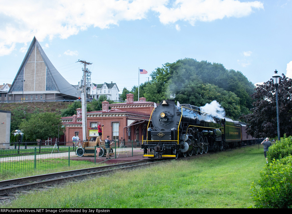2102 passes the Tamaqua station and the Trinity United Church of Christ